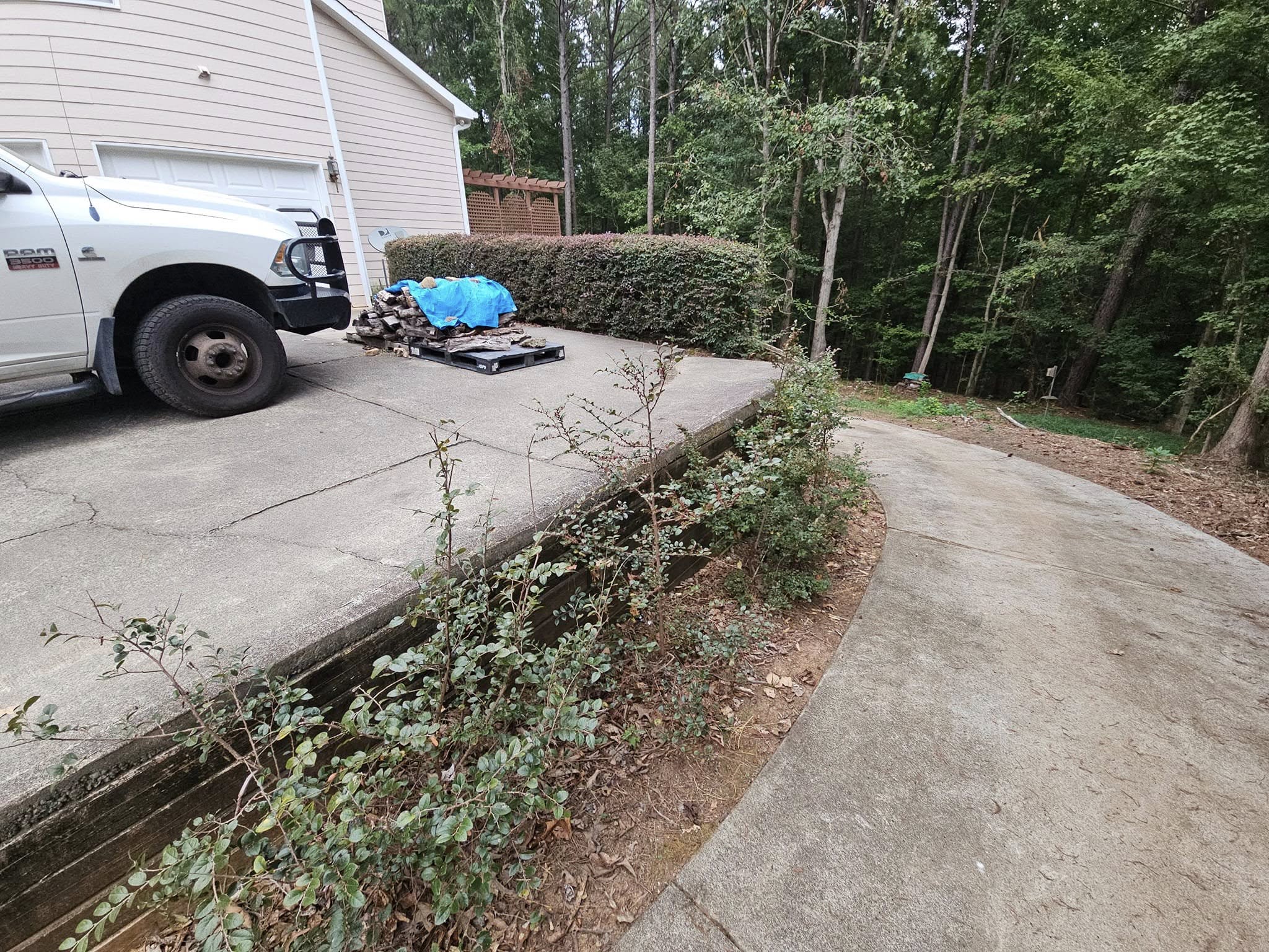 Before Driveway Repour with Structural Retaining Wall – Acworth