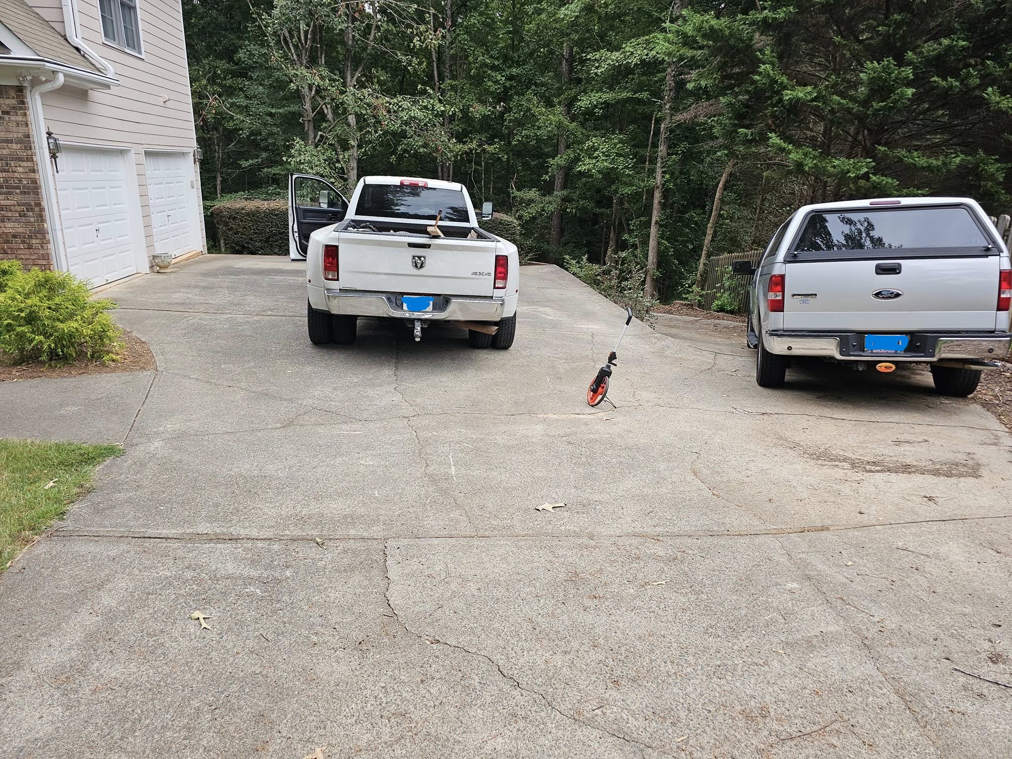 Before Driveway Repour with Structural Retaining Wall – Acworth