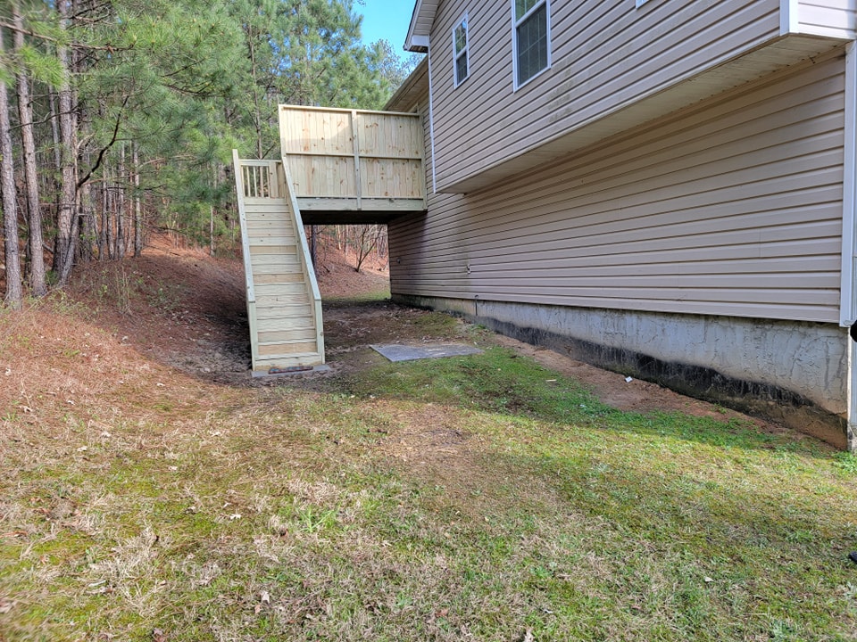 Before Patio with Poured Concrete Retaining Wall – Dallas